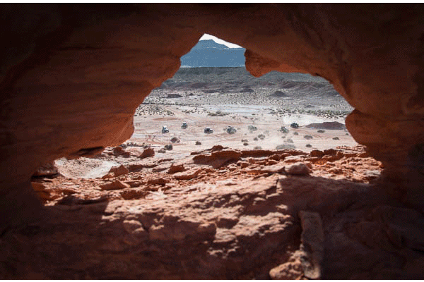 Julian Kilker - "10 minutes, 1,000 years" diptych showing rock art and vehicles on desert